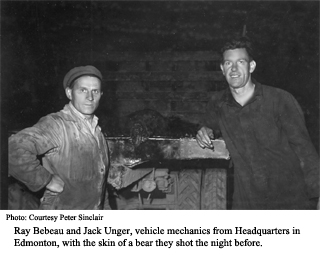 Ray Bebeau and Jack Unger with bear skin